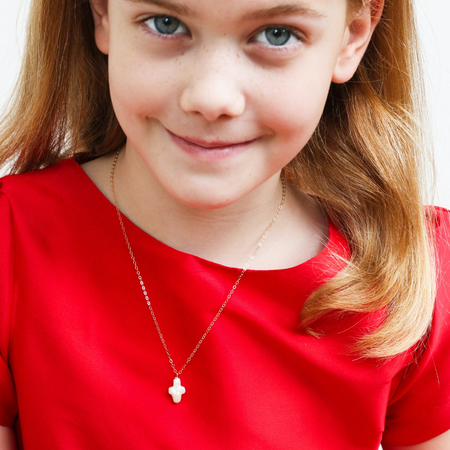 Model is wearing Little Cross Necklace_m donohue collection