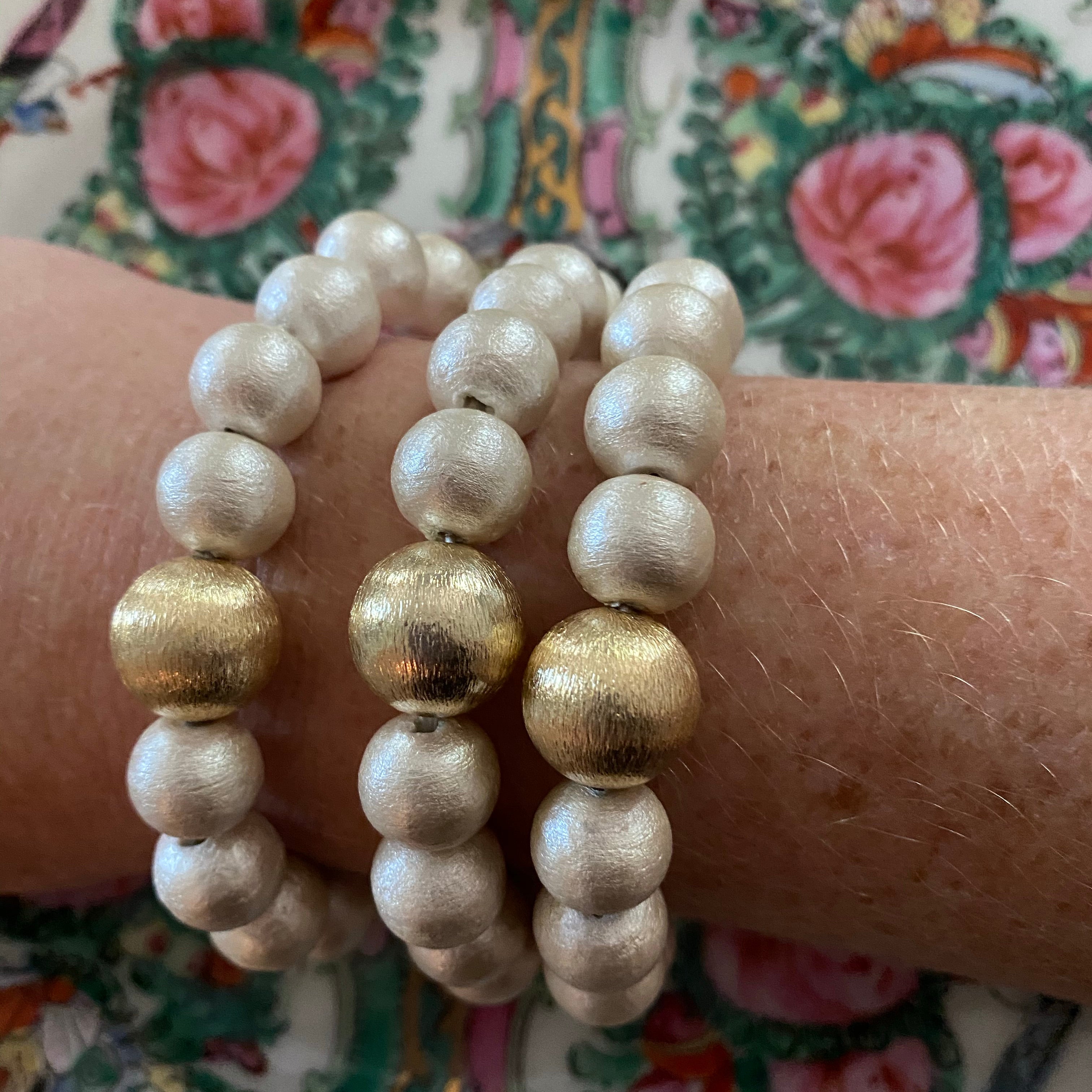 Model is wearing Olivia Cotton Pearl & Gold Bracelet_m donohue collection