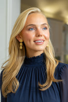 Model wearing Gold Lattice Triple Drop Earrings_M Donohue Collection