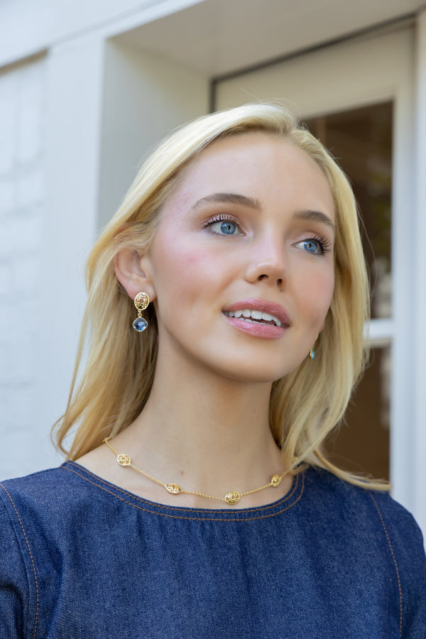 Model wearing Gold Lattice Blue Quartz Gemstone Drop Earrings_M Donohue Collection