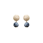 Pair of earrings with woven rattan post top and blue and white porcelain floral bead drop_ m donohue collection