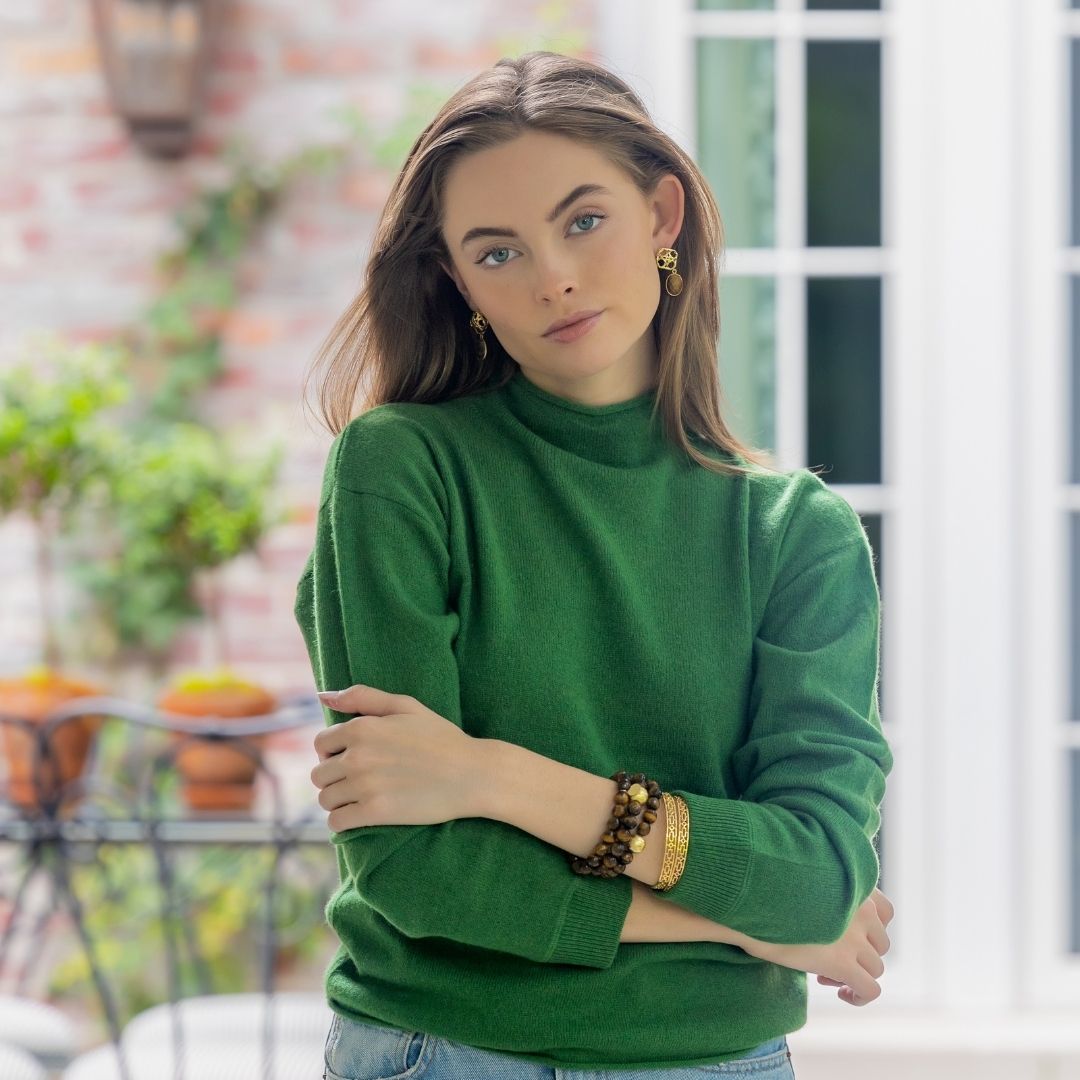 model wearing gold wicker post earrings with Tiger Eye gemstones_m donohue collection