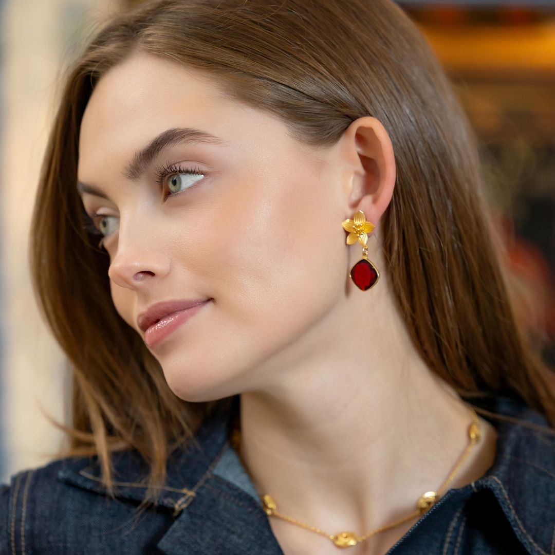 Model is wearing Cecile Garnet Drop Earrings_m donohue collection