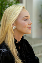 Model wearing Emerald & White Fleur Earrings_M Donohue Collection