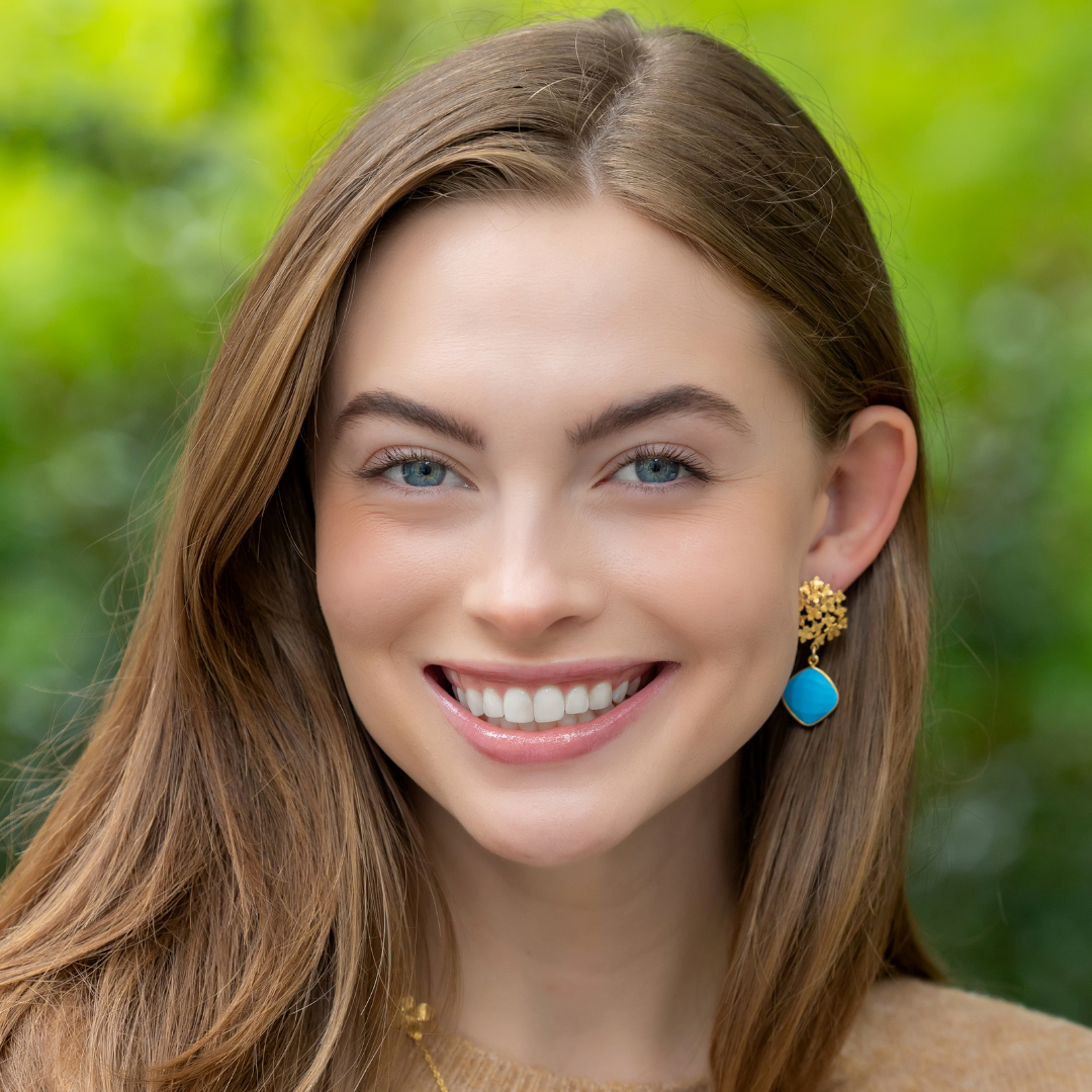 Model wears Jardin Hydrangea Turquoise Drop earrings_m donohue collection