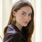 Model wears Remy Wicker Gold Oval & Carnelian Gem Earrings_m donohue collection