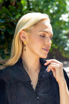 Model wearing Magnolia Flower Smoky Quartz Drop Earrings_M Donohue Collection