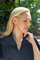 Model wearing Magnolia Flower Smoky Quartz Drop Earrings_M Donohue Collection