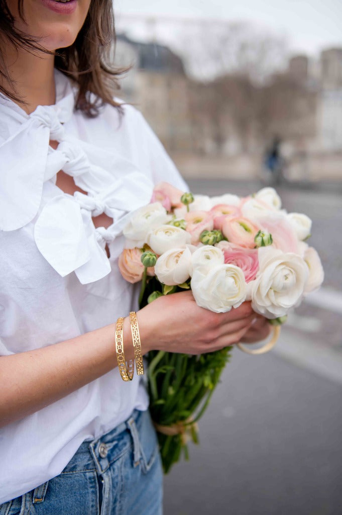 Model is wearing Maison Treillage Gold Bangle with the Versailles Treillage Gold Bangle_m donohue collection