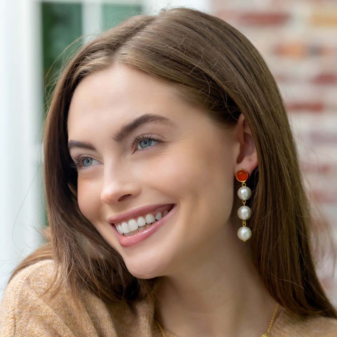 Model wears Triomphe Carnelian & Triple Cotton Pearl Earrings_m donohue collection