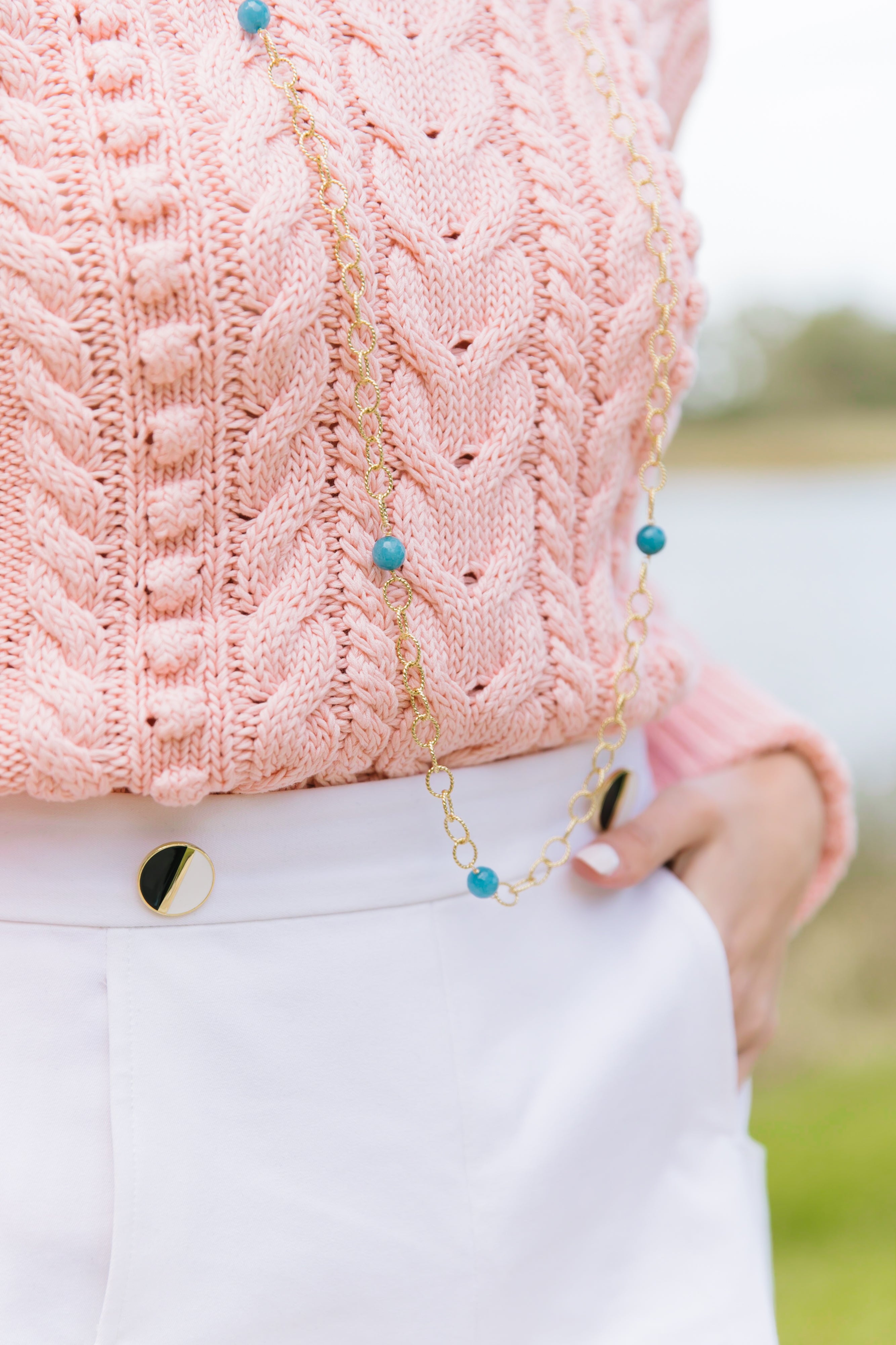 Model showing Annabelle aqua necklace worn long_m donohue collection
