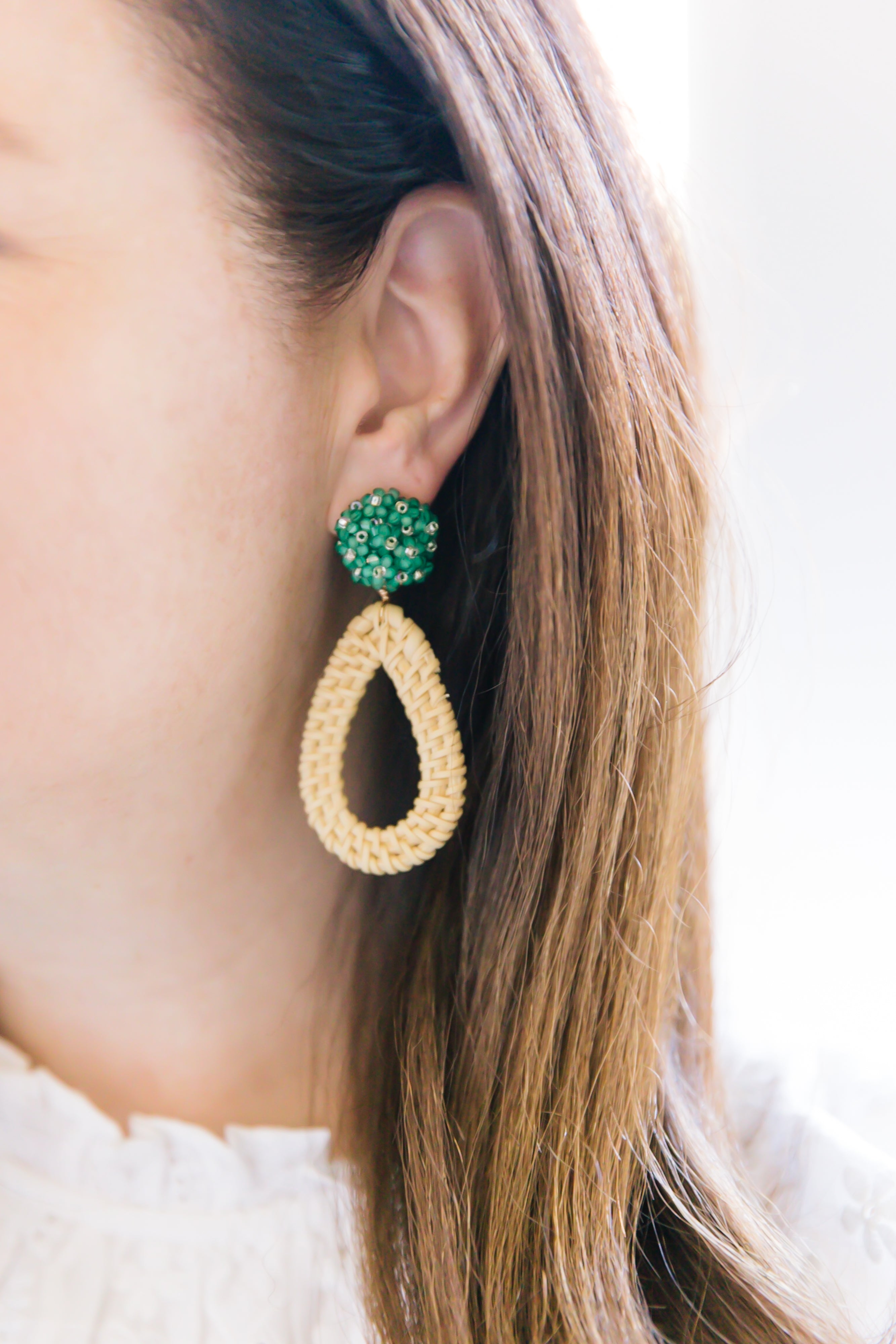 Model wears the Ava Green Rattan earring_m donohue collection