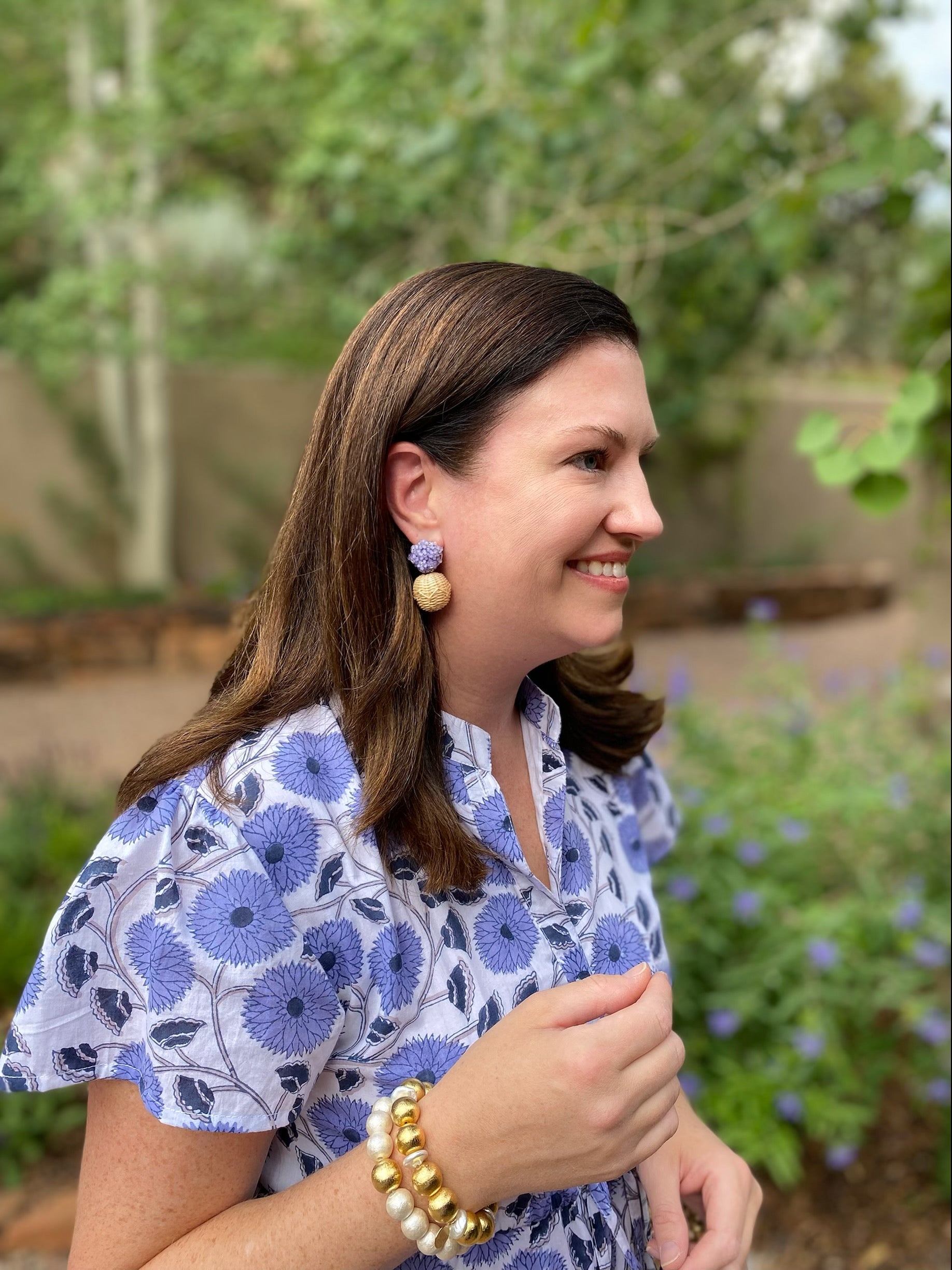 Model is wearing Liz Lavender Rattan Ball Earrings_m donohue collection